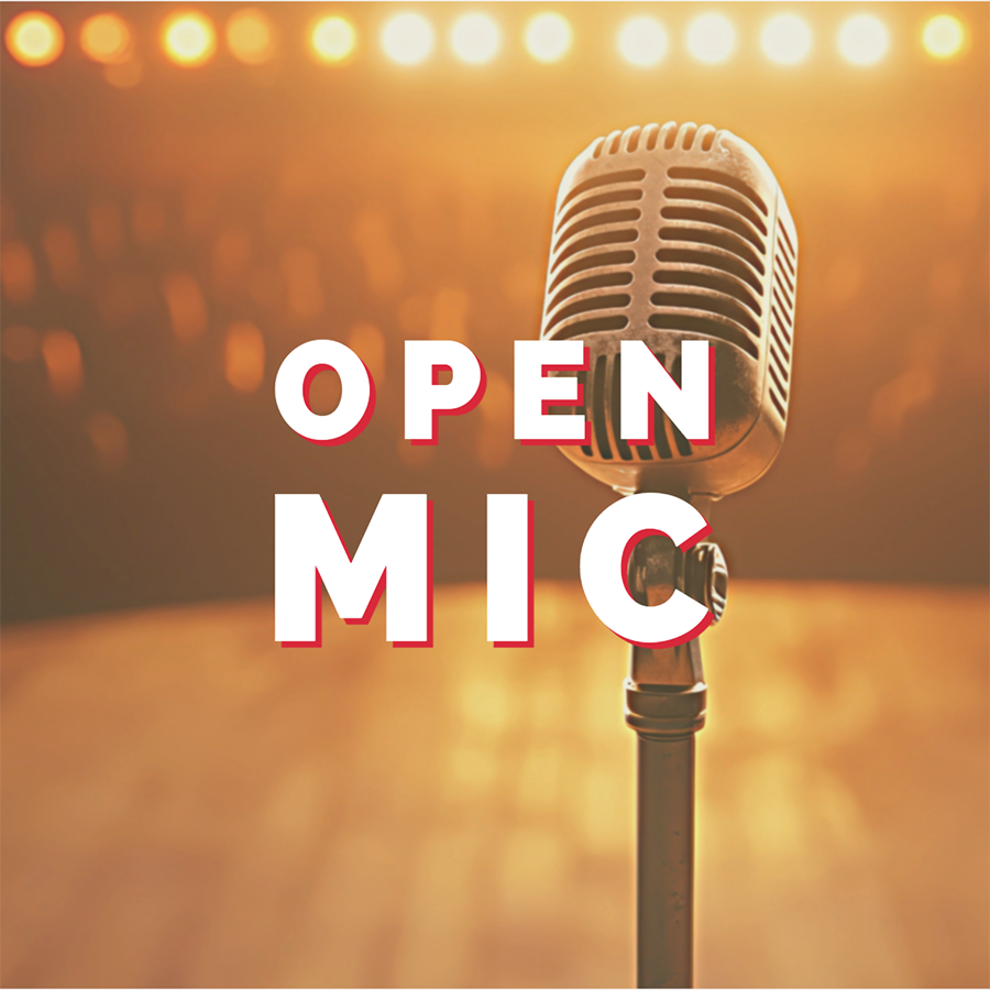 Microphone on stage with stage lights in the background. The words Open Mic